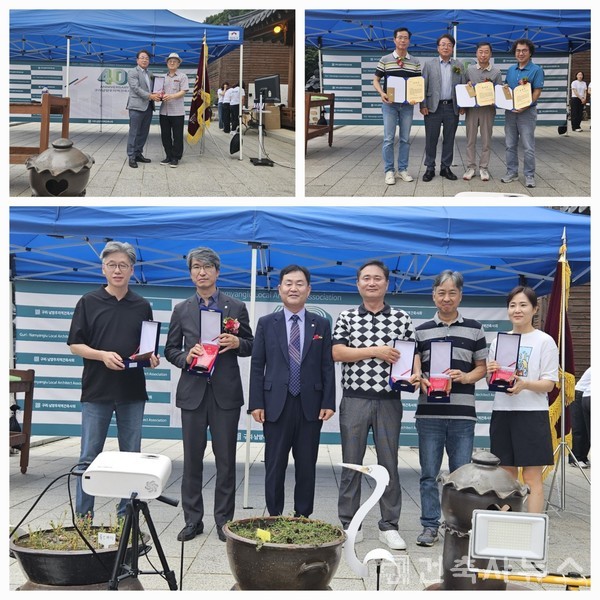 경기도건축사회 양정식 회장이 공로패와 공로상을 전달했다(사진=구리남양주지역건축사회)